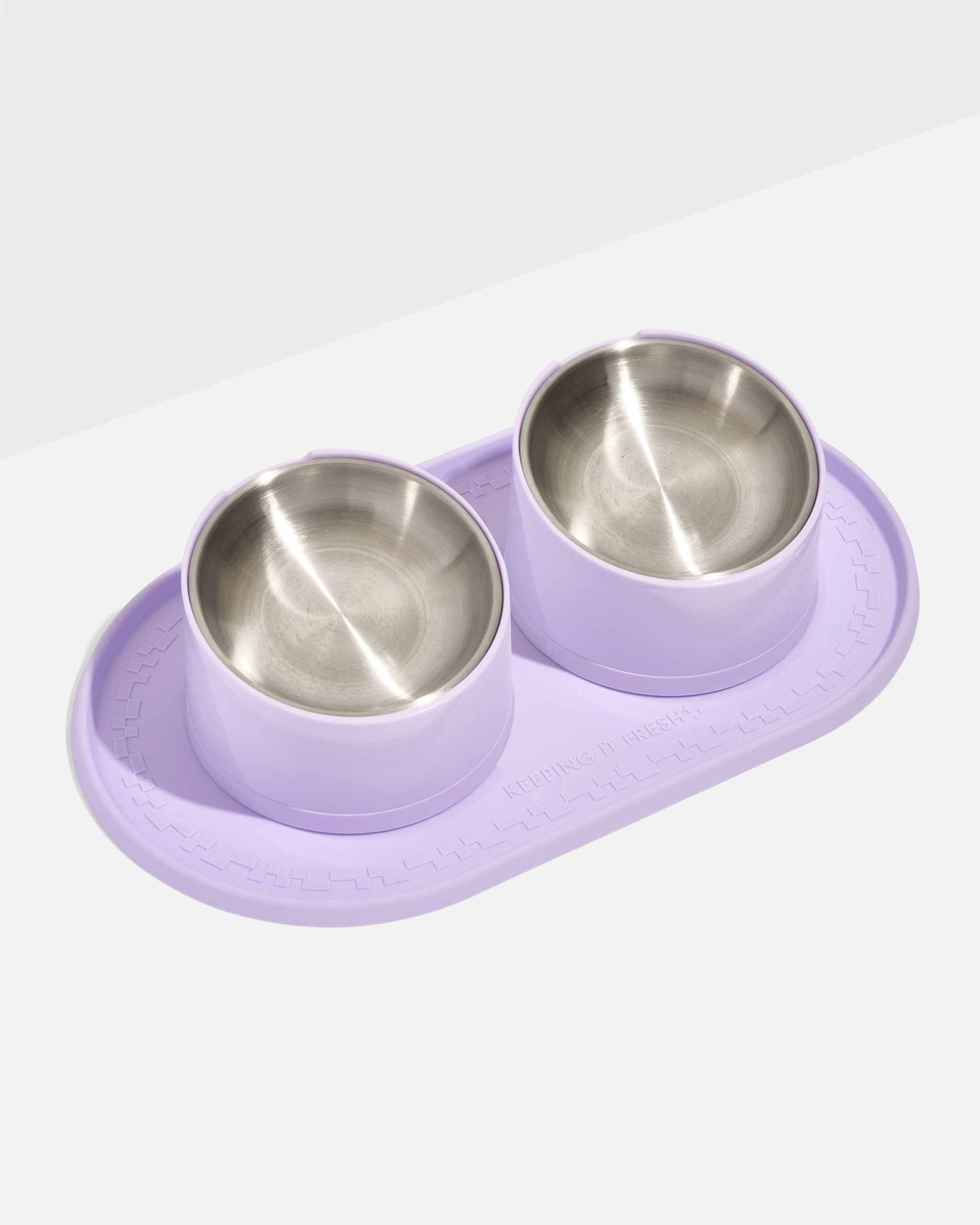 WO_VM_Cat_Placemat_SlantedBowl_Lilac_PDP_01_COMP_4x5_Web.jpg